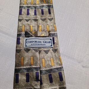 Gray and Yellow Patterned Tie with Architectural Design